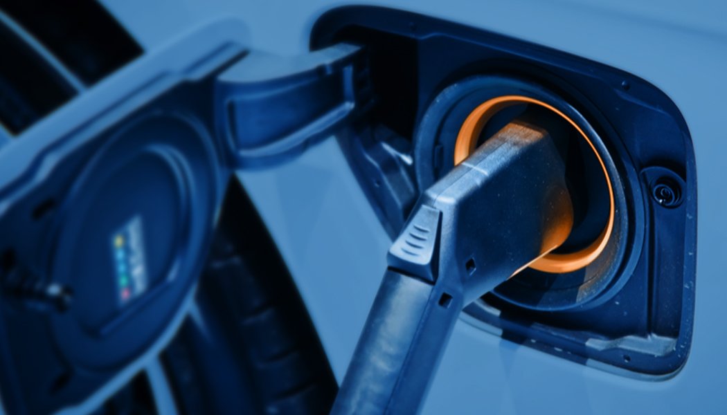 Picture of an electrified car fueling up. 
