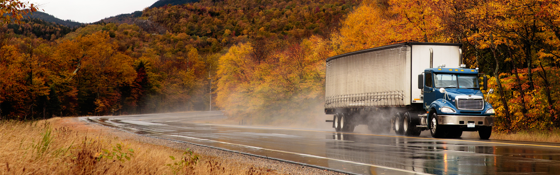 Max Coat Extra Hub - Wheels by Maxion Wheels: Image of a Truck on a wet road.