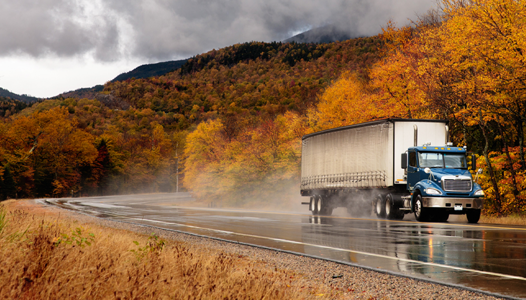 Max Coat Extra Hub - Wheels by Maxion Wheels: Image of a Truck on a wet road.