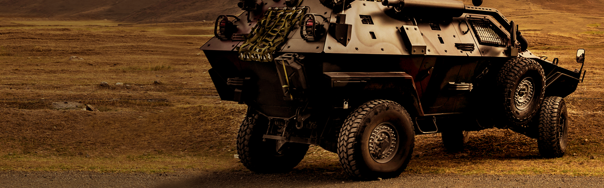 A Military Vehicle: Equipped with Specialty Wheels for Military Vehicles by Maxion Wheels.