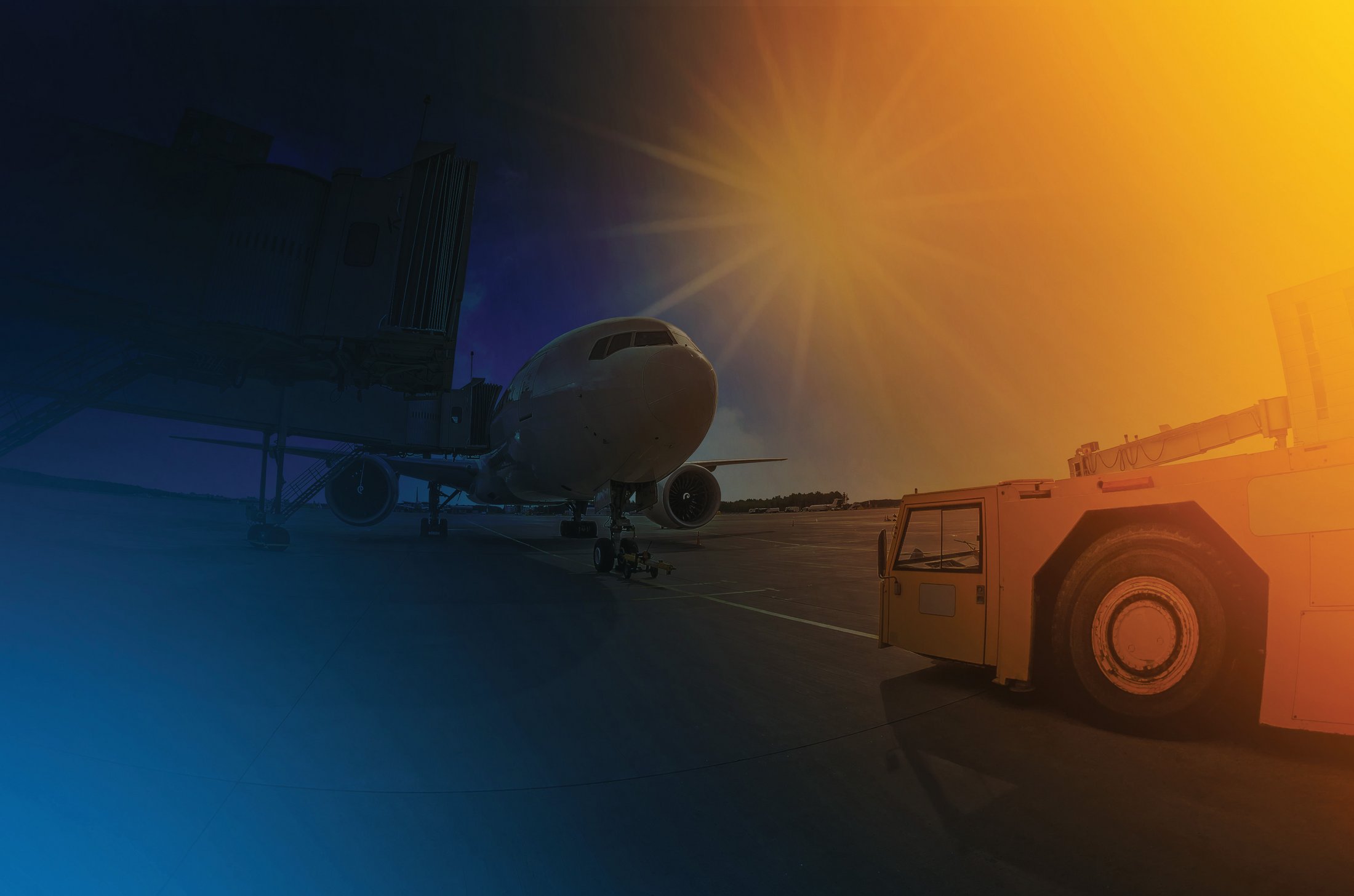 blue yellow gradient with airplane and towing truck fainted in the background