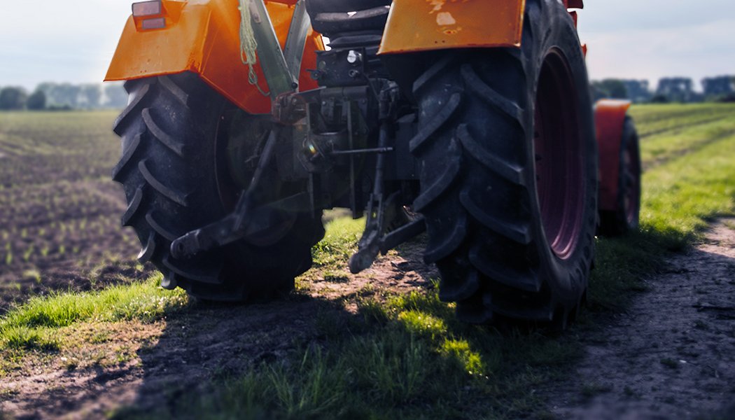 Tractor: Equipped with Specialty Wheels for Agriculture Purposes, produced by Maxion Wheels.