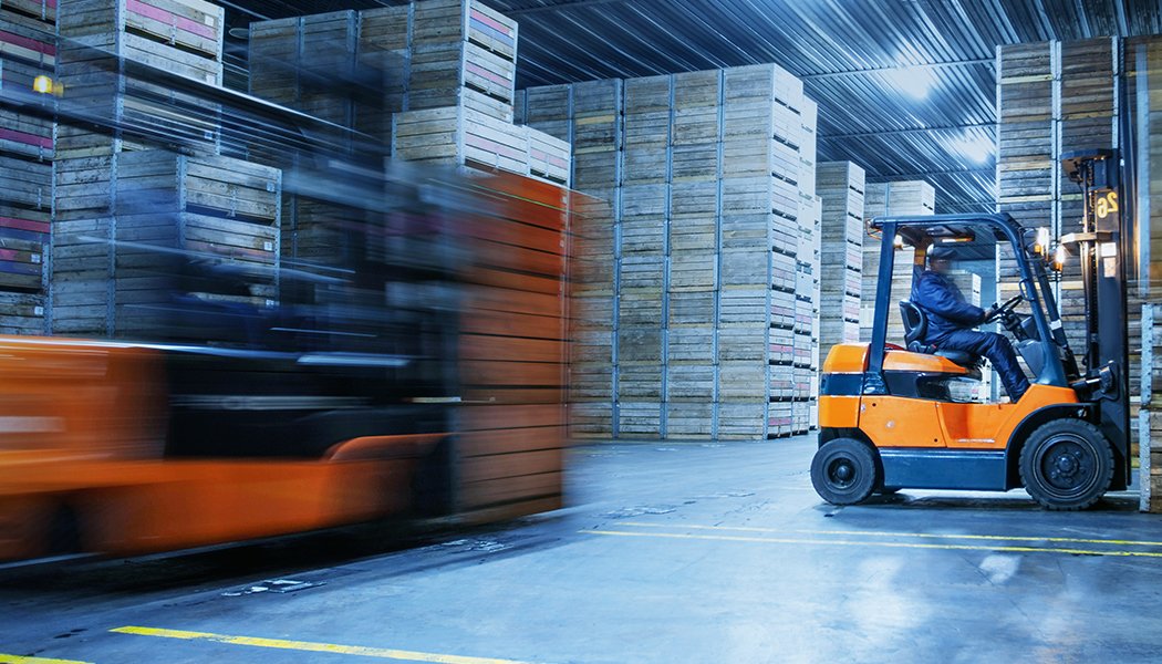 Forklifts in a warehouse: Equipped with Specialty Wheel for Forklifts by Maxion Wheels.