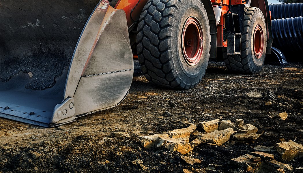 Dumper Loader: Equipped with Specialty Wheels for Construction Site Purposes, produced by Maxion Wheels.